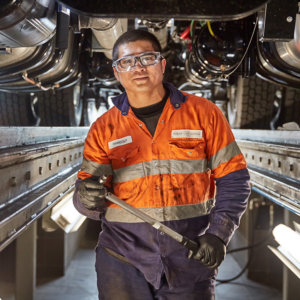 A mechanic standing in their workshop